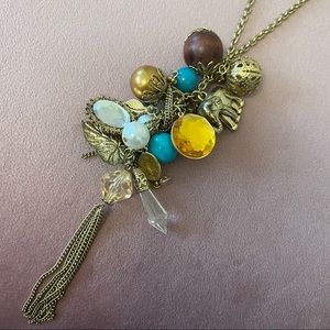 ALDO LONG GOLD CHARM NECKLACE